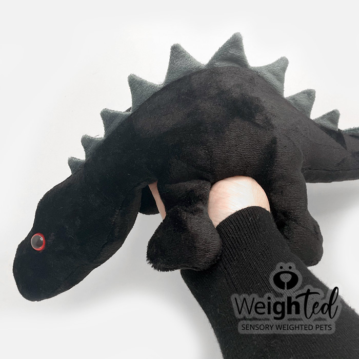 Weighted stuffed dinosaur